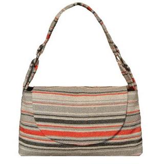 Illustration for article titled Kim White Creates Handbags From Vintage Automotive Interior Fabric